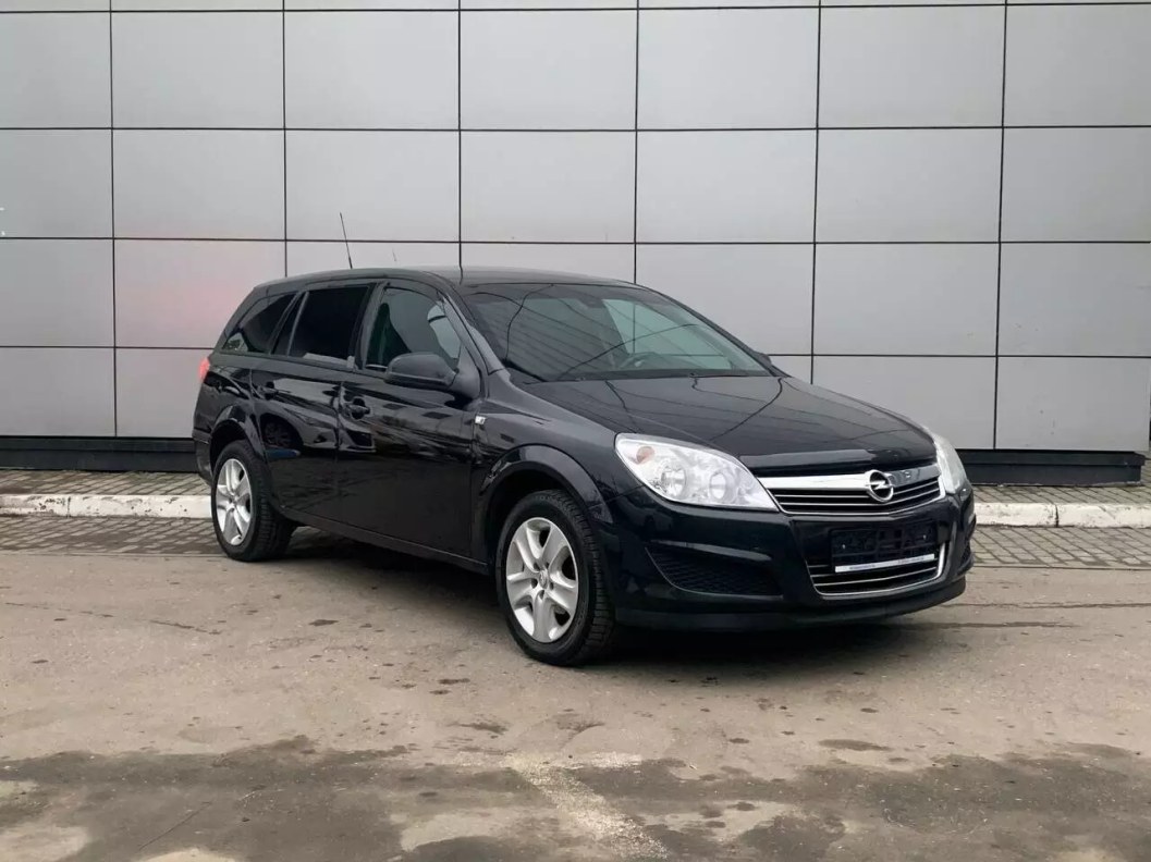 Opel Astra 1.8 АКПП, 2014 фото 1